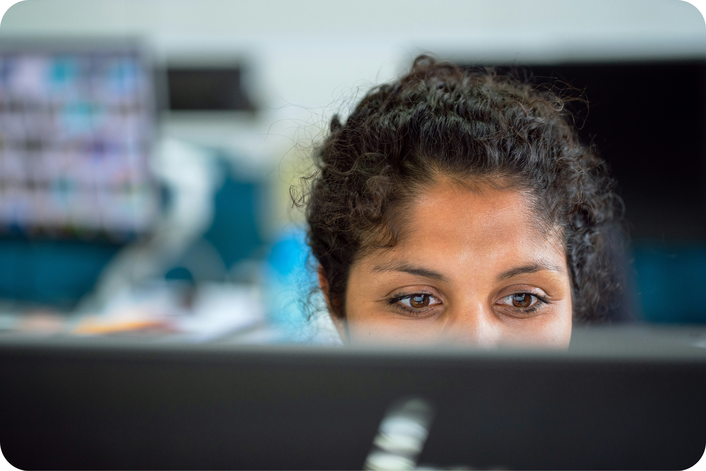 Image of a person behind computer